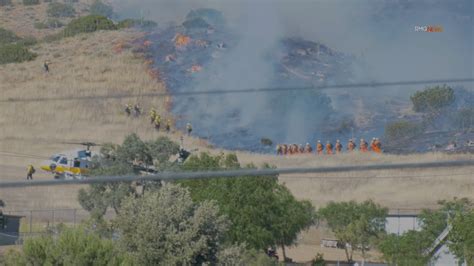 Brush fire erupts in Acton; firefighters halt forward progress